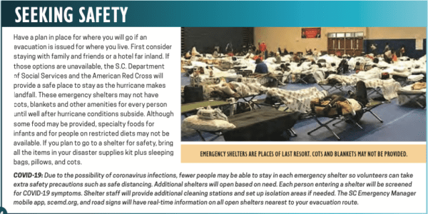 Hurricane Shelter with people sleeping in cots